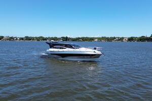 2025 Real 40 HT Luxury yacht cruising on a sunny day.