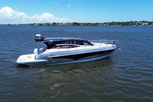 2025 Real 40 HT Luxury yacht cruising on a sunny day.