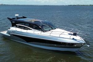 2025 Real 40 HT Luxury yacht cruising on a sunny day.