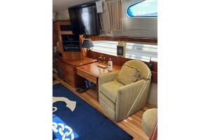 Interior of 2004 Carver 466 Motor Yacht with cozy seating an