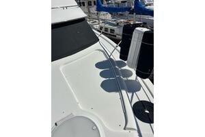 2004 Carver 466 Motor Yacht deck with fenders and railing in