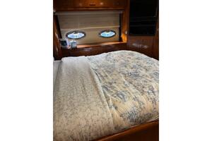 Luxurious bedroom interior of 2004 Carver 466 Motor Yacht wi