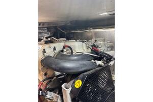 Engine compartment of a 2004 Carver 466 Motor Yacht, featuri