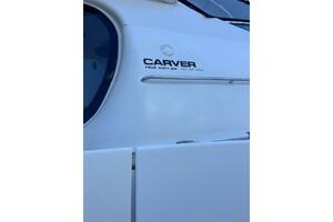2004 Carver 466 Motor Yacht side view with logo detail.