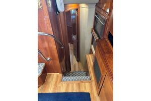 Interior of 2004 Carver 466 Motor Yacht with wooden stairs a