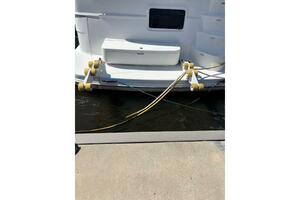 2004 Carver 466 Motor Yacht docked with mooring lines and fe