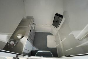 Center Console Boat Head Compartment with Sink and Storage