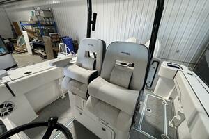 Premium Bolstered Helm Seats with Armrests on Center Console