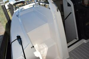 Portside Boarding Steps Make Fixed Dock Access Easy. Cabin Entry Door To Left Of Helm