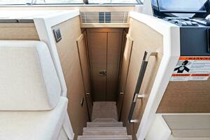 2024 42 Prestige Flybridge - Companionway to Staterooms