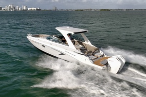 Photo 6024931 for 2020 Crownline Eclipse E 305 XS  Crownline E305 XS powered by twin 225hp Mercury outboards. Spacious bow and cockpit seating, hardtop shade, swim platform, and onboard head. Ideal for cruising, sandbar stops, and watersports.