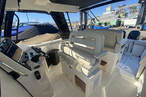 2023 Boston Whaler 350 Realm interior with helm and seating area.