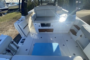 2023 Boston Whaler 350 Realm boat interior with seating and storage compartments.