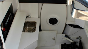 Photo 7424642 for 2020 Blackfin 332 Center Console Got Tuna Interior Cabin with Sink Area