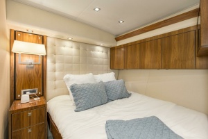 Photo 6159219 for 2016 Viking 92 Enclosed Bridge Touché 2016 92 Viking Enclosed Bridge Touche Port Stateroom (1)